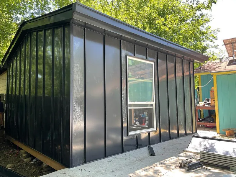 Black standing seam metal wall panels for Metal Roof Installation in Ives Estates